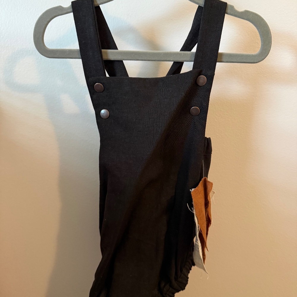 Black overall onesie
